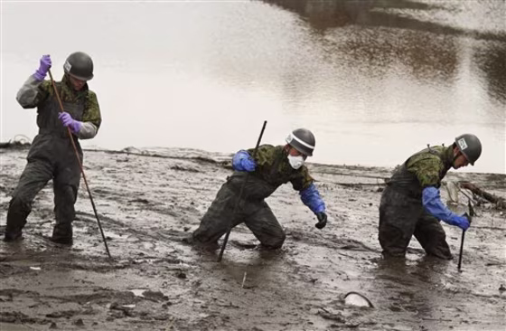 Japan Ground Self-Defense Force members search for missing people in their third major recovery operation since the March 11 earthquake in Shichigahamamachi, Miyagi Prefecture, northeastern Japan,&nbsp;on April 25.